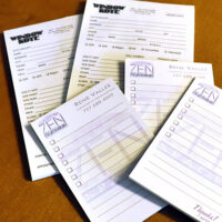 notepads laid out on table
